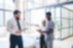 The brokers and a couple are in a house. The broker sells the house at the paat